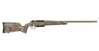 Ergonomic .300 Win Mag bolt action rifle with Mossy Oak Camo stock.
